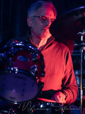 Arthur playing the drums.